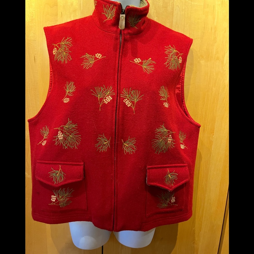 Woman’s size Large. British Khaki brand red embroidered vest. No tags